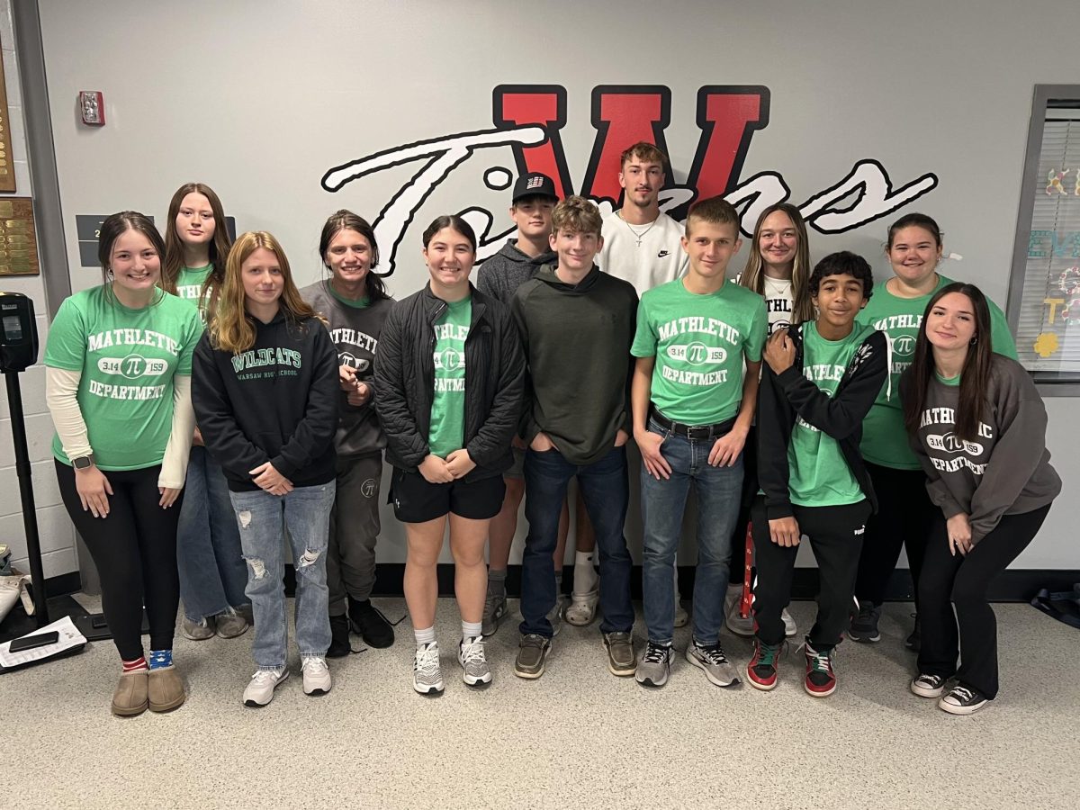  The Warsaw math team competed at Warrensburg High School. They finished 4th as a team and missed 3rd by 2 points. They included: (back row) Maya Jolliff, Michael Schliefert, Brennen Slavens, Logan Gemes, Elizabeth Winters, Jordan Dove; (front row) Madison Lawrence, Elsie Hughes, Jessie Bilderback, Henry Breshears, Isaac Daughenbaugh, Lhandon Rose, and Eden Gilley.