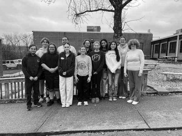 Vocalists are headed to state on May 1. They include (front row) Gabe Wassman, Sonia Lasseigne, Alysia Yoder, Amelia Roberts, Angela Cerecero and director Deanna Schockmann;  (back row) Eli Long, Ayden Burdick, Jayden Culbertson, Dillan Ellison, Addison Hill and Chloey Brazel.