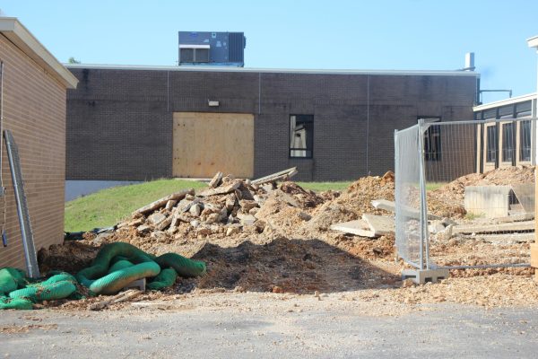 Sidewalks that students previously used to travel from the main high school building to the science and art annex have been demolished to prepare for the addition of new classrooms and restrooms.