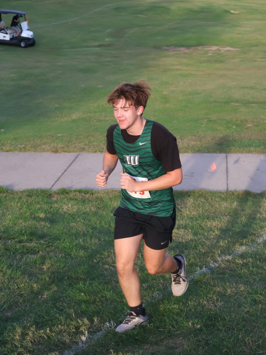 Sophomore Brody Boggs runs in the Sept. 30 Warsaw cross country meet. 