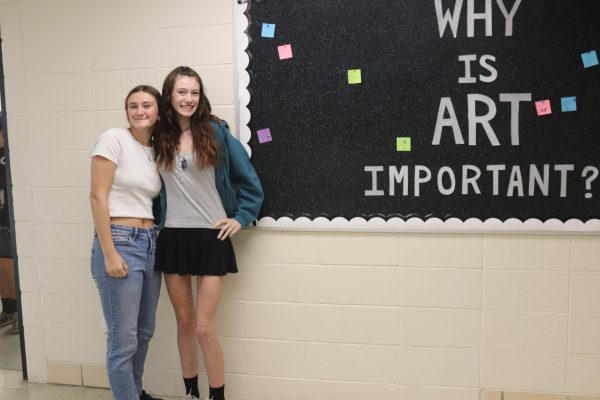Freshman Faith Hartley and new WHS student freshman Isabella O'Leary mug for the camera. "The world is changed by your example, not your opinion," O'Leary said.
