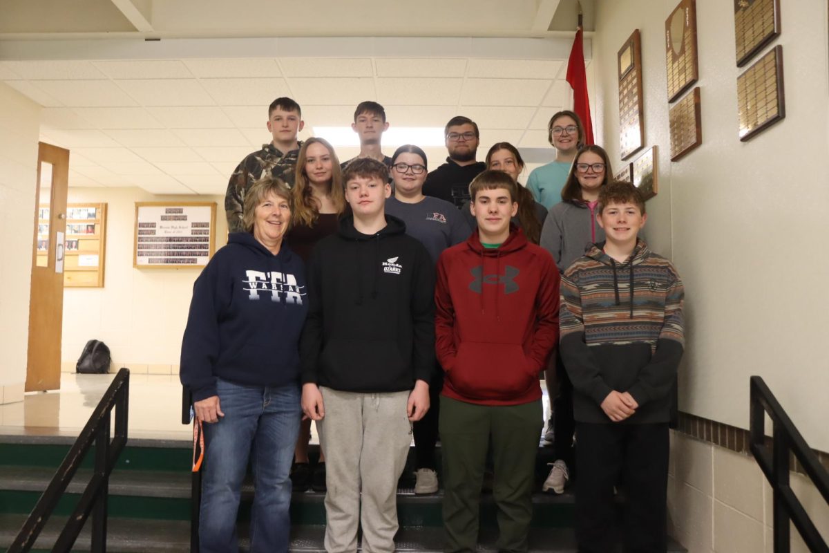 State archers prepare to leave for Branson on March 18. They included: (front row) coach Jackie Downing, Eli McDunner, junior Barron Ward, Zane Ledbetter, (second row) senior Daytona Kinnan, senior Hayley Case, sophomore Kaylee Jackson, Braelyn Wood; (back row) Kanyan Salley, junior Levi Bilderback, junior Connor Hockett, freshman Brynlee Wood.