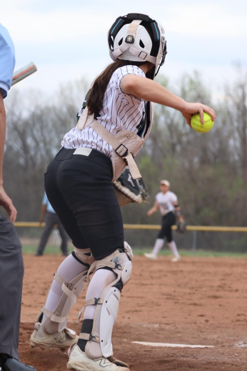 Sophomore Emmersyn Miskell gets ready to throw the ball back to freshmen Kenyan Beck.